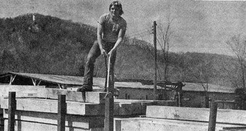 Bob Meyer unloads ties at the sawmill