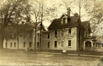 Side view of the Postville hospital, postcard postmark 1910