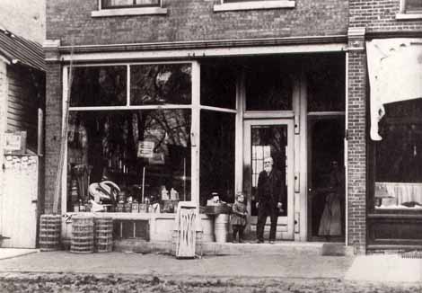 Marengo store-front with Wm Snavely? and child