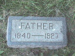 William Baker head stone says Father Baker