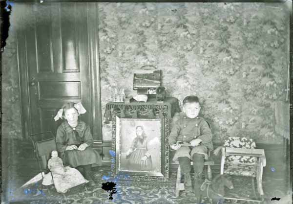 Knud Rasmussen family, Two Children with Female Photo/Painting, Poplar, Iowa