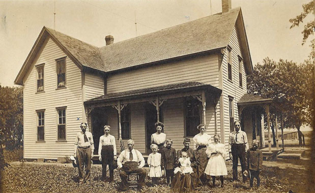 August & Maria Ramthun family in front of their house