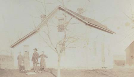 Jennings family in front of their home ca1895