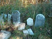 Pile of gravestones at Wagner twp. cemetery - photo by S. Ferrall
