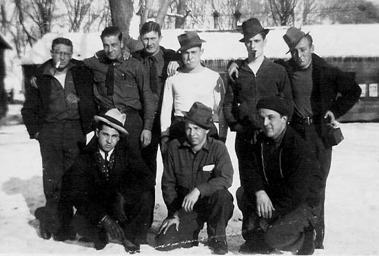 Group of camp members (unidentified) on campgrounds.